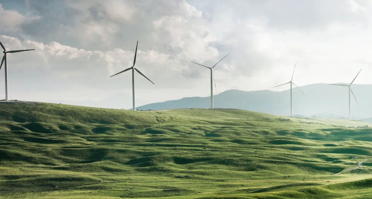 Wind turbines across a broad open landscape